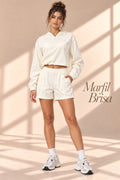 Marfil Brisa ivory hooded pullover and shorts set, front view