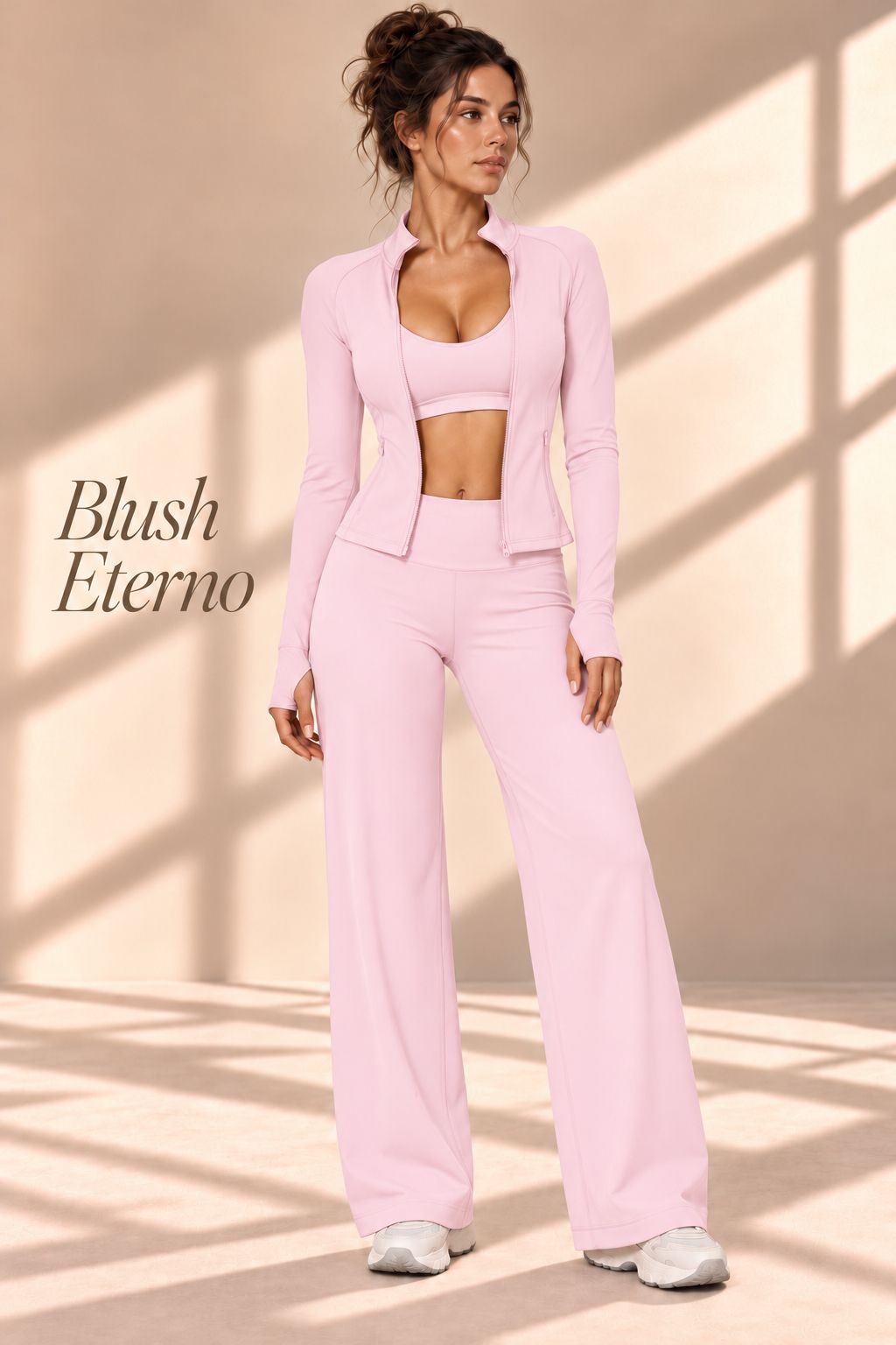 Front view of the Blush Eterno pink three-piece set with jacket, cropped top and wide-leg pants