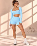Brisa Celeste sky-blue two-piece set with square-neck long-sleeve cropped top and high-waisted shorts