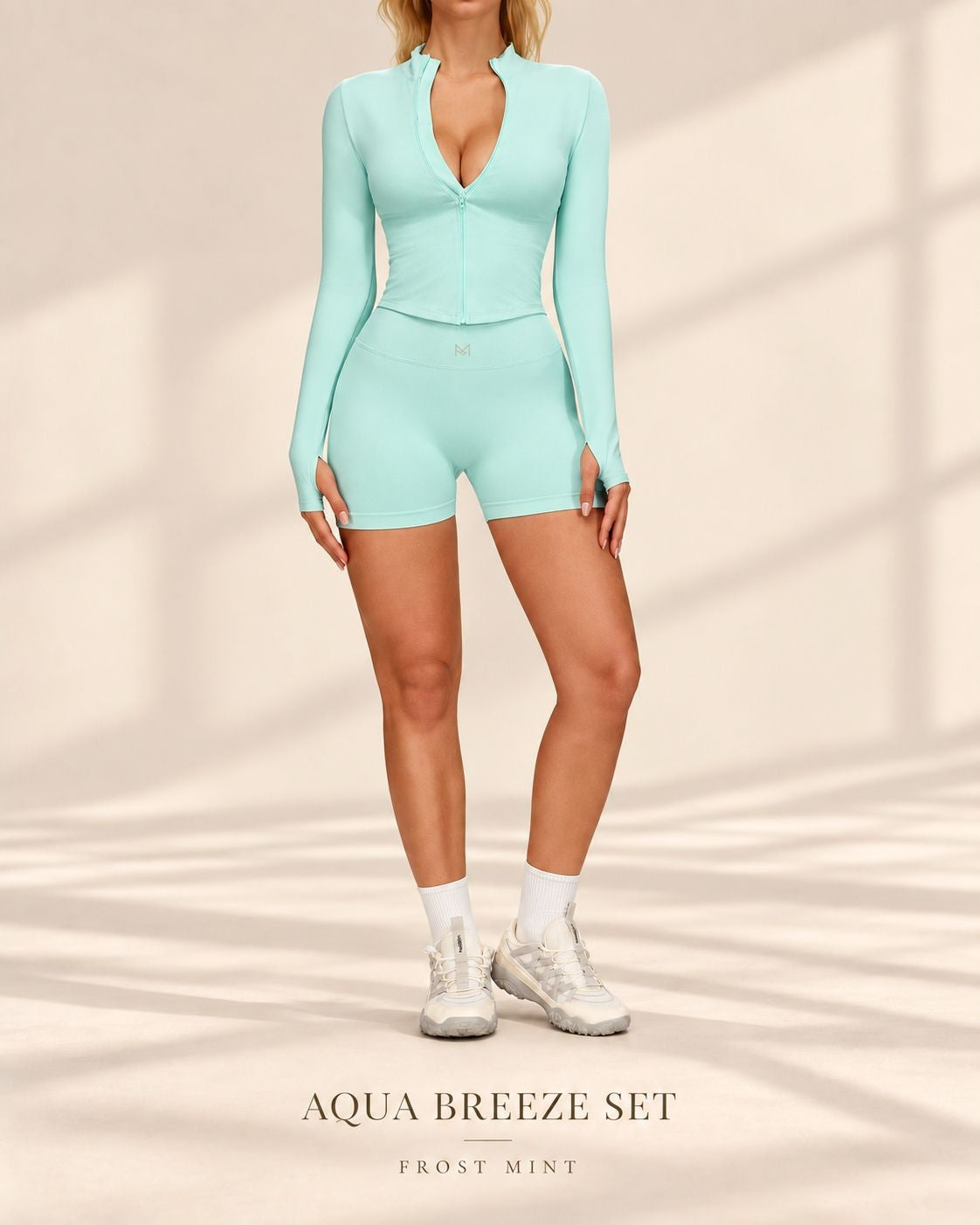 Front view of Aqua Breeze Set in Frost Mint with zip-front long-sleeved top and matching shorts