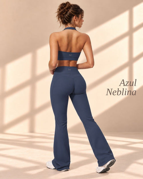 Back view of Azul Neblina blue open-back halter top and matching flare pants