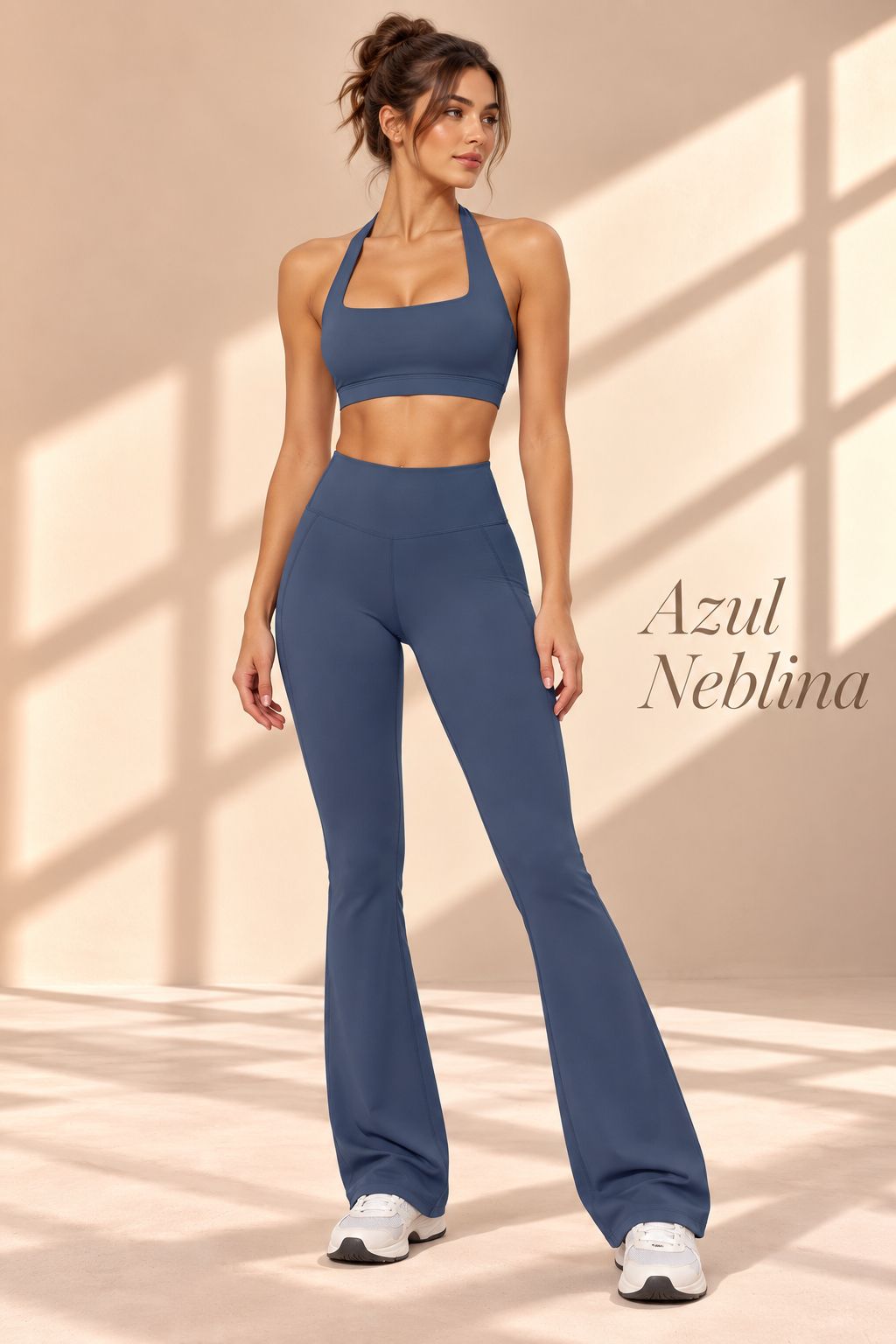 Front view of Azul Neblina blue halter crop top and high-waisted flare pants