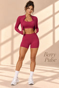 Front view of Berry Pulse berry crop top, cropped long-sleeve jacket, and fitted shorts