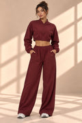 Front view of Bordeaux Track set with cropped zip-front jacket and wide-leg pants with pockets