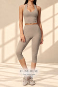 Front view of Dune Muse warm-taupe halter crop top and capri leggings