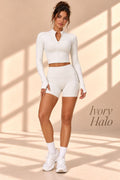Front view of Ivory Halo ivory cropped zip-front jacket and fitted shorts