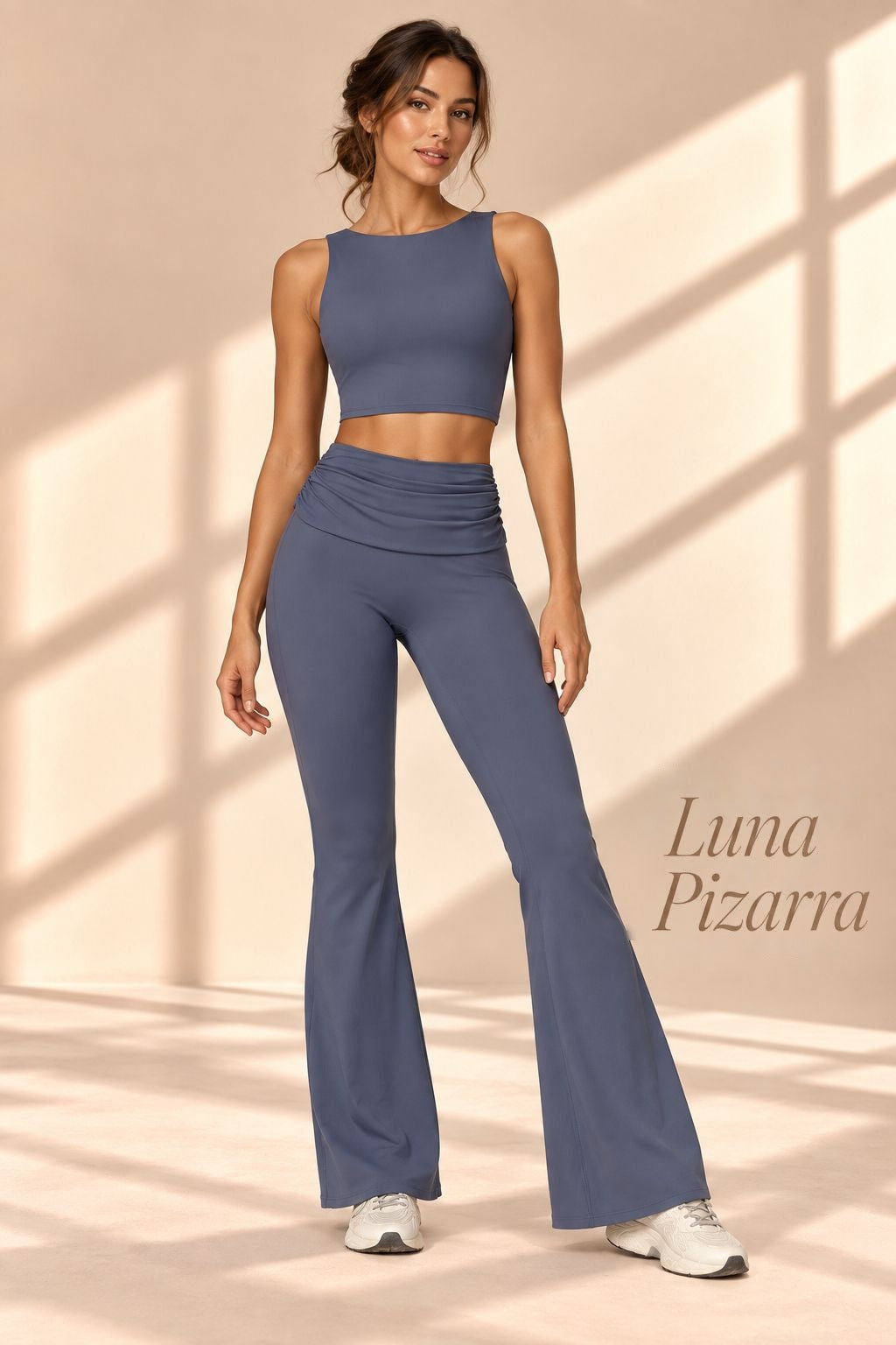 Front view of Luna Pizarra slate-blue sleeveless crop top and flare pants