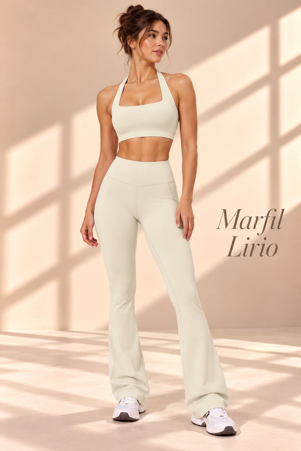 Back view of Marfil Lirio ivory open-back halter crop top and matching flare pants
