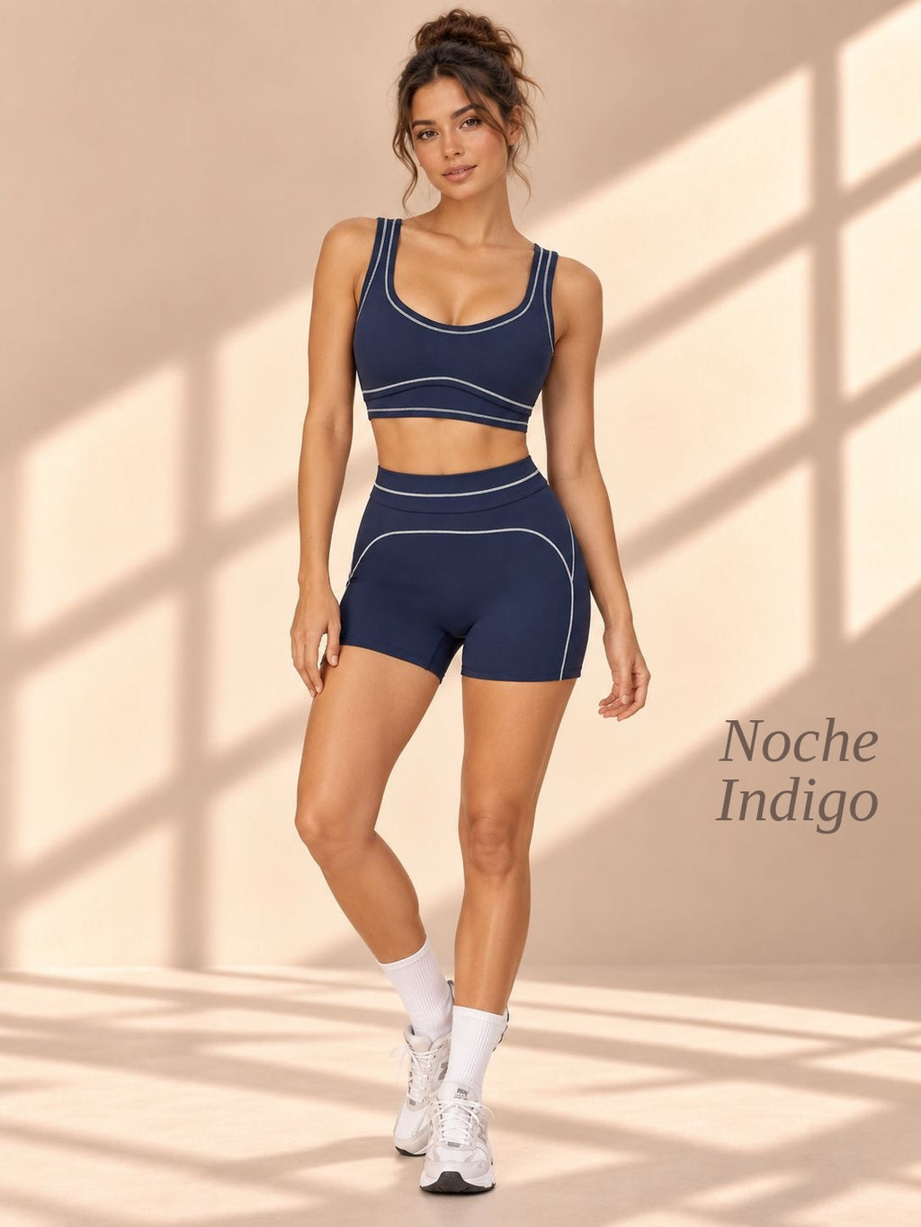 Front view of Noche Índigo indigo crop top and shorts with curved light piping