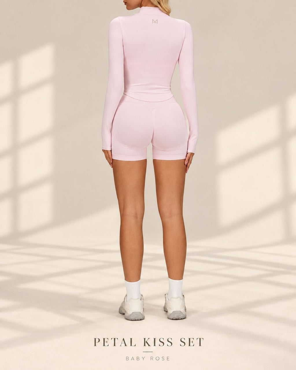Back view of Petal Kiss Set in Baby Rose showing long-sleeved jacket and fitted shorts