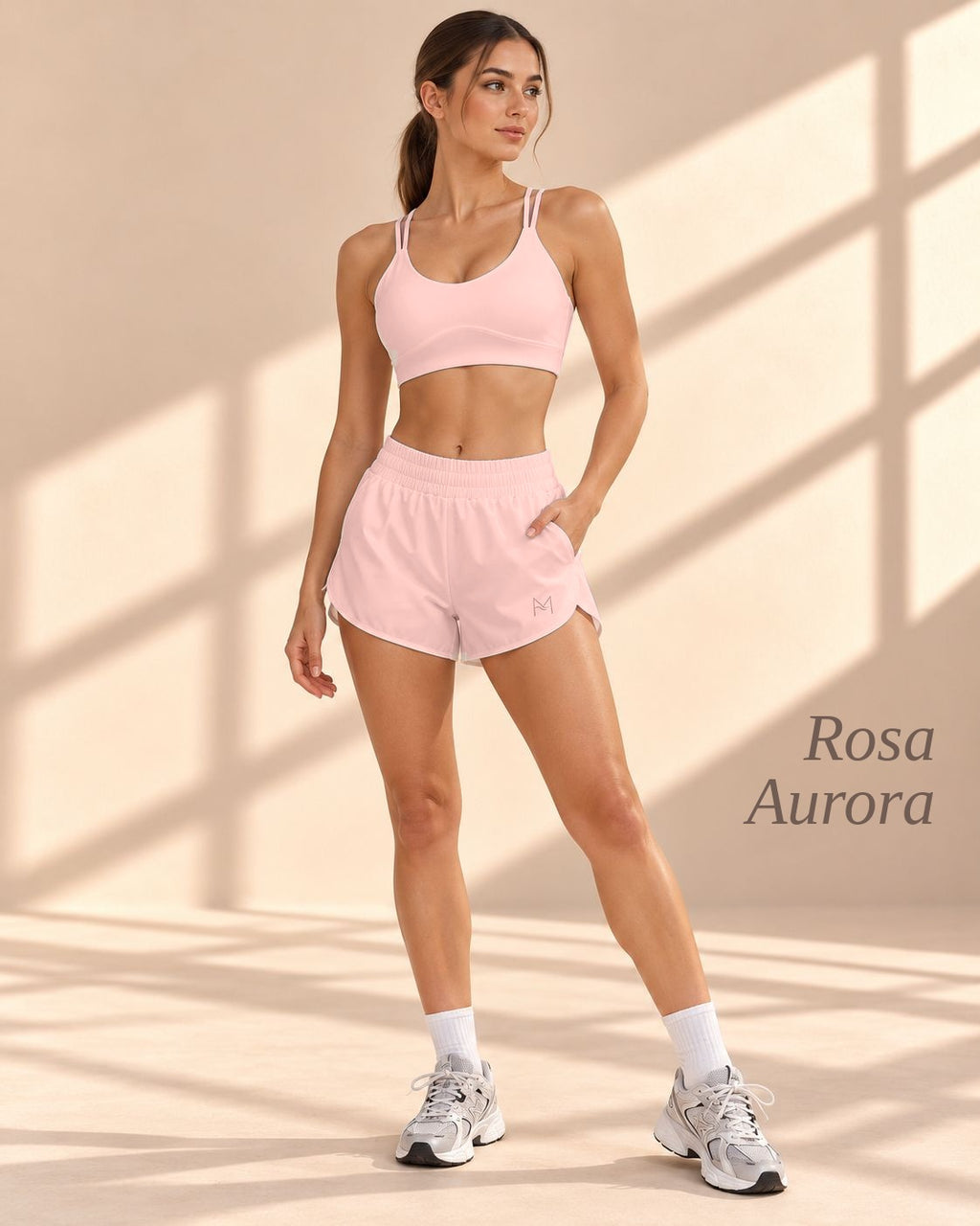 Front view of Rosa Aurora light-pink strappy crop top and relaxed shorts