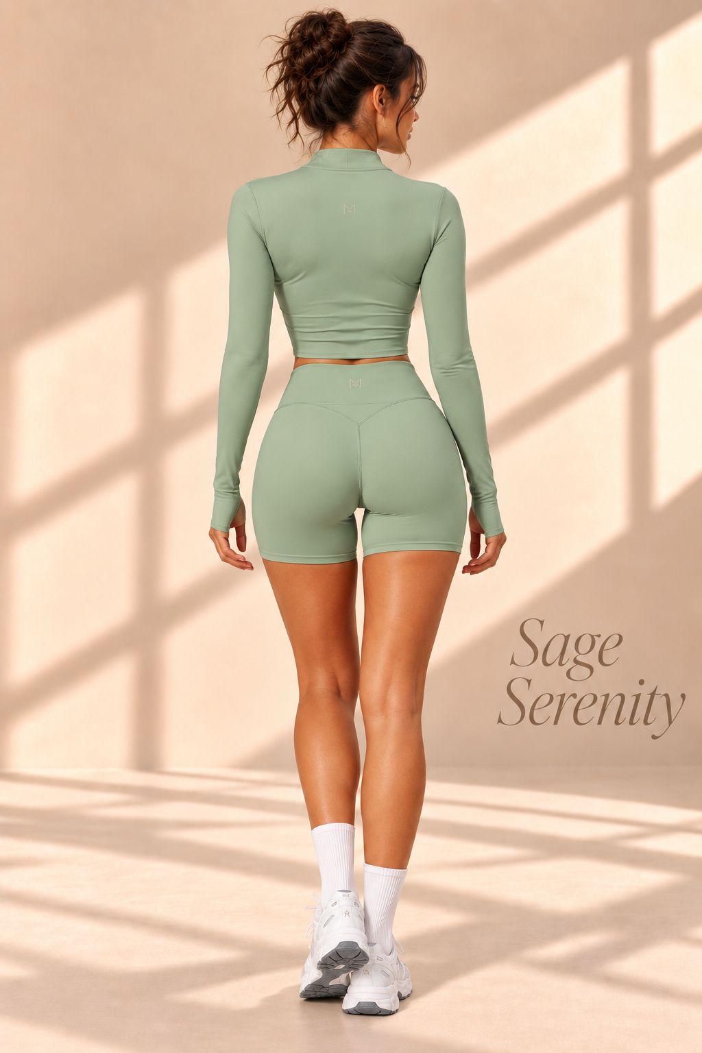 Back view of Sage Serenity sage-green cropped long-sleeve jacket and matching shorts