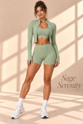 Front view of Sage Serenity sage-green crop top, cropped jacket, and fitted shorts