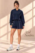 Azul Sombra navy hooded pullover and shorts set with white piping, front view